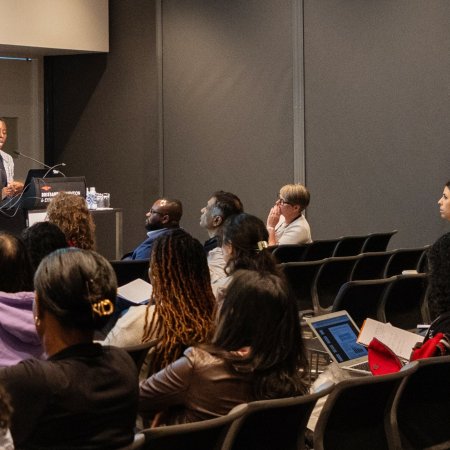 Onikepe Owolabi, Vice President for International Research, presents her research on abortion stigma in Nairobi and Burkina Faso at the International Population Conference in Brisbane, Australia in July 2025.  (Photo by NEOTEQ) 