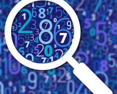 An image of scattered numbers blurred out, with a looking glass showing clear numbers. 