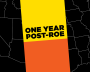 Black outline of the United States with a yellow and orange banner that says, "One year post-roe"